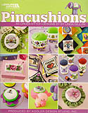 Pincushions: Take your pick of these pretty, precious, puffy pincushions by Linda Gillum! Have fun cross stitching the small, take-along motifs, then see how easy it is to fashion them into delightful and useful accents for the bedroom, kitchen, bath, laundry, or sewing room.