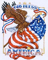 God Bless America! The magnificent bald eagle above the unfurling stars and stripes is symbolic of this nation's spirit and ideals. This design by Linda Gillum is bound to stir patriotic emotions, fill hearts with pride, as well as honor those who serve their country, past and present.