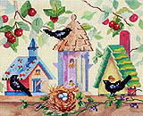 Welcome feathered friends to our row of charming bird homes!