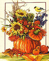 Vibrant and festive, this Counted Cross Stitch piece will compliment any decor during the fall season. 
