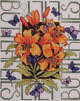 Butterflies are surrounding a beautiful bouquet of lilies