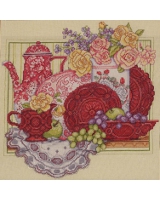 Lovely red china and glassware set a perfect Tea Time.