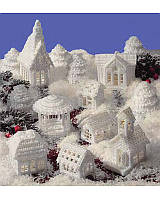 What says Christmas better than a village covered in glistening snow? Easy instructions include a complete grouping of charming houses, a gazebo, trees and a church to complete your frosty holiday village. All designed using white 7-mesh plastic canvas. This classic pattern uses a few easy-to-do stitches using white worsted weight yarn.

