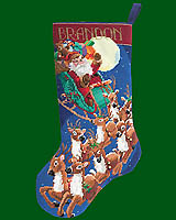 Merry Christmas to all and to all a good night! Santa continues on his magical, moonlit journey in a sleigh led by eight favorite reindeer. This beautifully detailed wool Needlepoint stocking is filled with charm and whimsy.