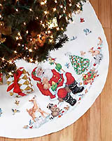 Celebrate a woodland Christmas as gleeful celebrants gather 'round the snow laden tree - Dinner is served!