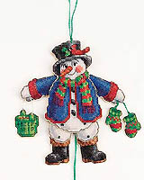 Snowy, with bucket in hand, is ready to feed his feathered friends! Jumping Jack snowman will bring smiles to all who receive this whimsical ornament.