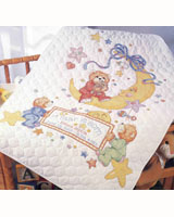 These teddy bears are ready for bed on this Celestial crib cover.