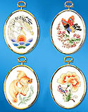 Oriental Treasures: Take a trip to the Orient when you embroider these lovely designs. A butterfly with cherry blossoms, a lovely goldfish, a colorful chrysanthemum and an elegant crane.