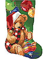 This Christmas teddy bear might be the perfect stocking for a new little kid in your family. Our bold and bright design is unusual in it's big blocks of color, but still detailed and fun to stitch. Complete with an adorable little rainbow spinning top and Christmas orbs, this stocking from Kooler doesn't lack any cuteness!
--